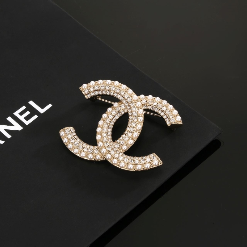Ch**el brooches